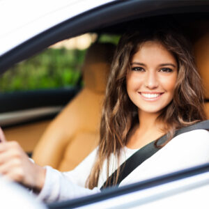 Woman Driving After Buying Auto Insurance in Alliance, OH