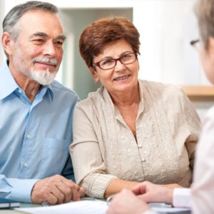 Couple Buying Small Business Insurance in Alliance, OH